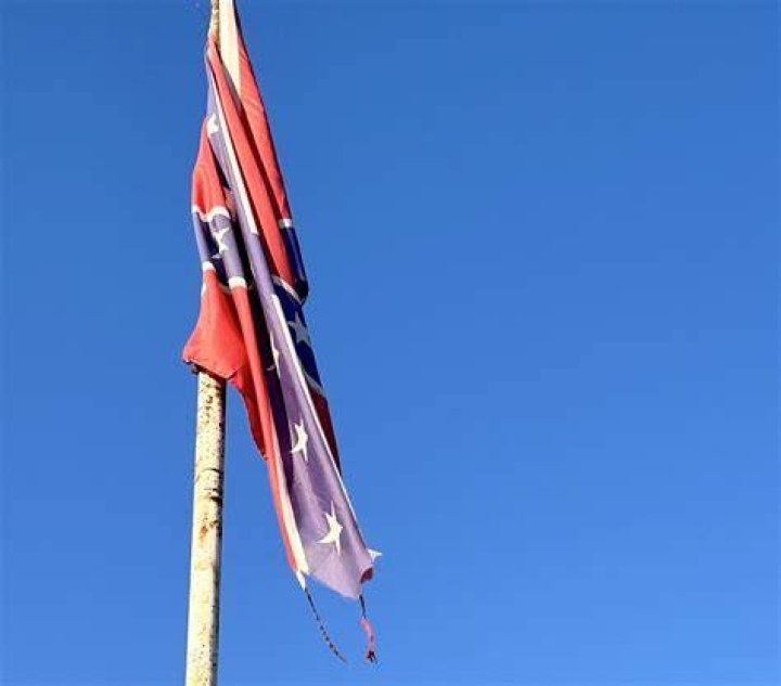 A confederate flag hangs on the property in Munith, Michigan, where the group trained