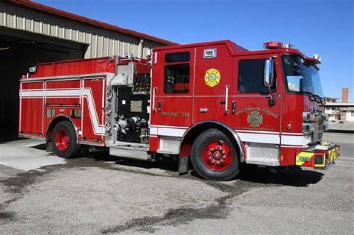 A fire engine rested on the side of the road after sliding off in Tuesday's icy conditions