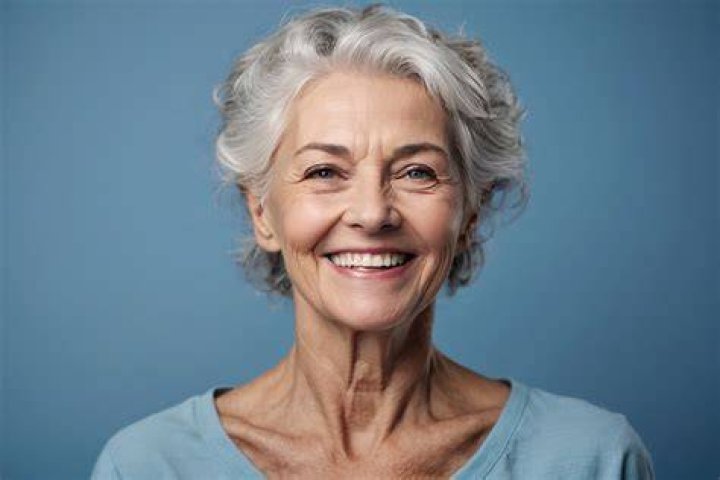 A smiling senior woman | Source: Shutterstock
