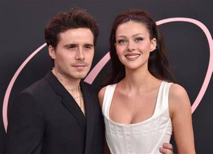 Actress Nicola Peltz (R) with brother Will Peltz attend the "Transformers: Age Of Extinction" New York Premiere at the Ziegfeld Theater on June 25, 2014, in New York City. | Source: Getty Images