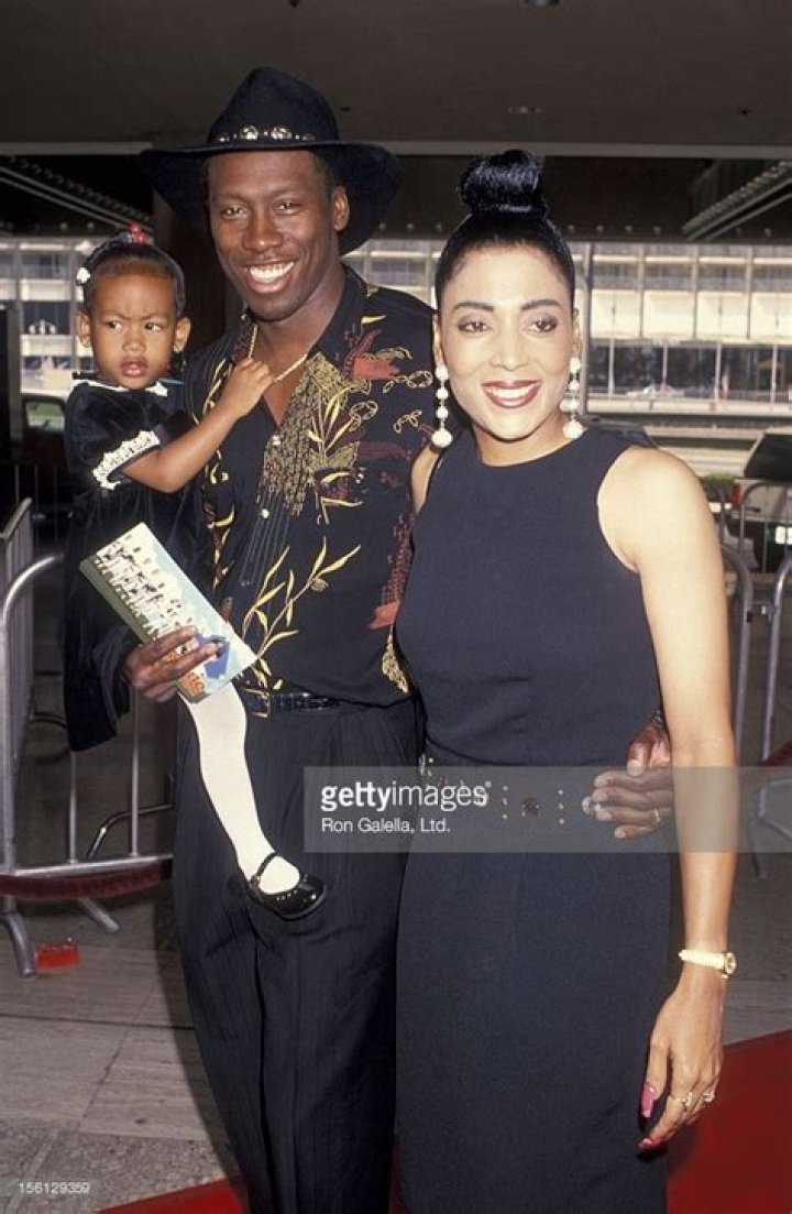 Al Joyner, Flo Jo Griffith Joyner and Mary Joyner at Alice Deal Jr. High School | Source: Getty Images