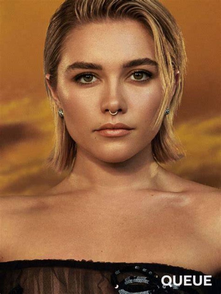 All that glitters: Florence Pugh wore a plunging gold sparkling number