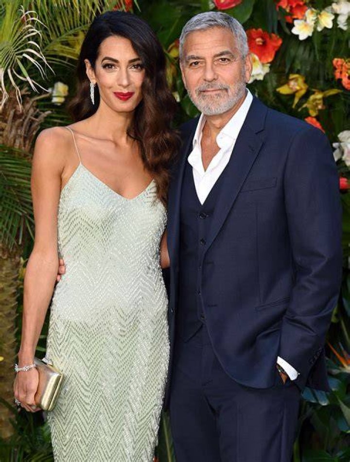 Amal Clooney and George Clooney attend the premiere of "Ticket To Paradise" at Regency Village Theatre on October 17, 2022 in Los Angeles, California | Source: Getty Images