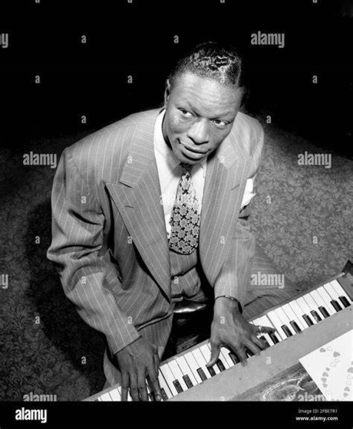 American singer and pianist Nat 'King' Cole during a visit to London. | Photo: Getty Images