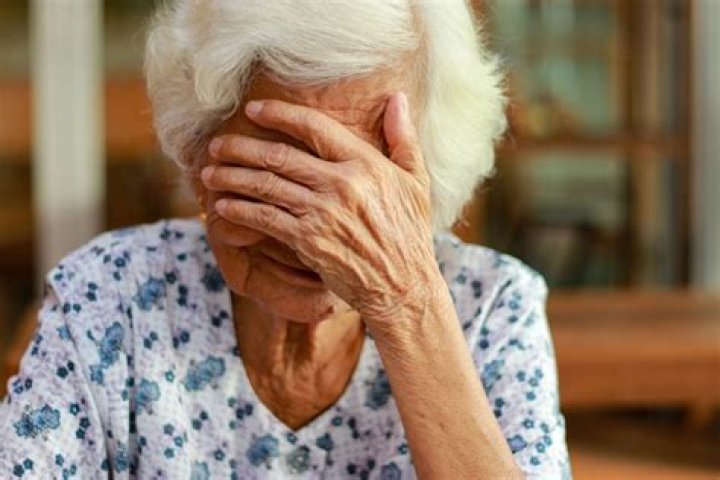 An elder woman upset at a dinner table. | Source: Getty Images