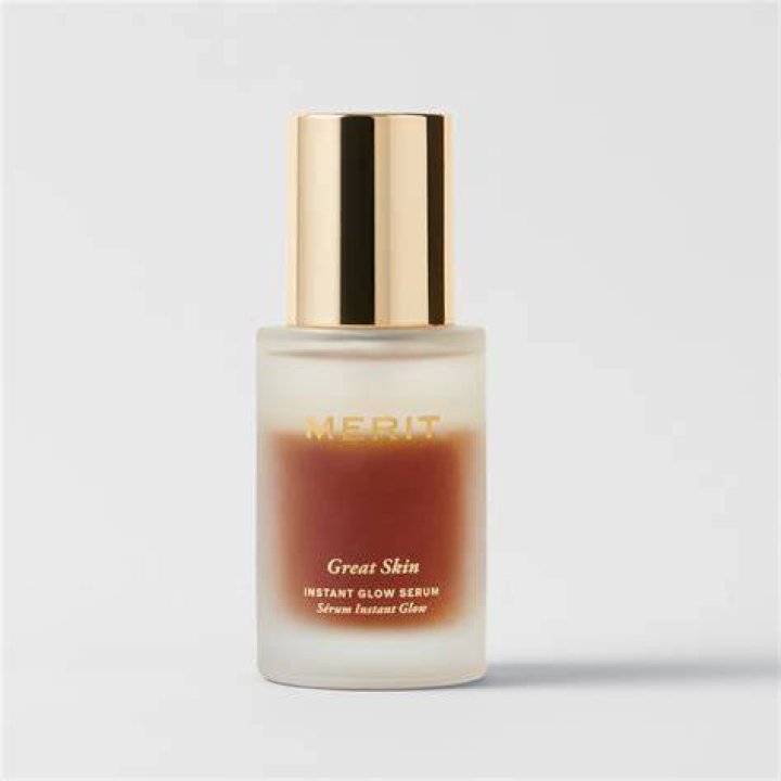 author wearing merit beauty great skin serum