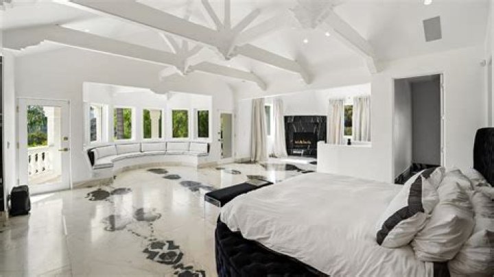 Bedroom of John Stamos's Beverly Hills home. | Source: YouTube/Architectural Digest