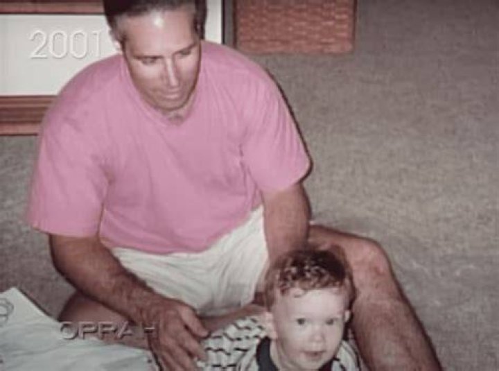 Ben watches Little Bryan crawling. | Source: