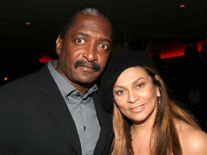 Beyonce, Matthew and Tina Knowles at the "Beyonce: Beyond the Red Carpet' auction in 2005 | Source: Getty Images