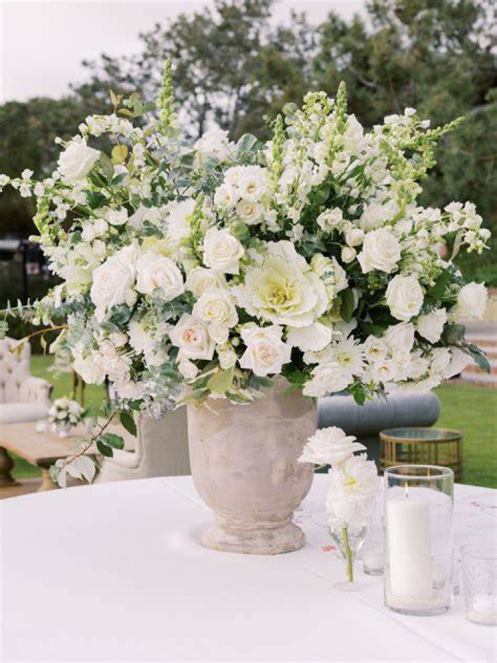 Big day: White floral arrangements were delivered ahead of the wedding on Saturday morning