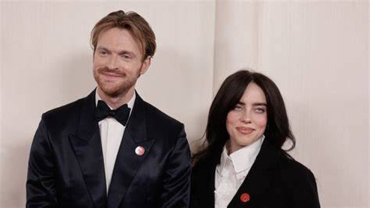 Billie Eilish and Finneas O'Connell hold the award for Best Music (Original Song) for "No Time to Die" as they attend the 2022 Vanity Fair Oscar Party following the 94th Oscars at the The Wallis Annenberg Center for the Performing Arts in Beverly Hills, California | Source: Getty Images