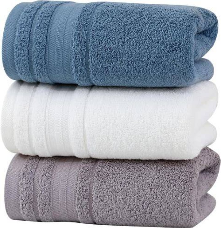Both the bath towels and larger pool towels are too small to cover her