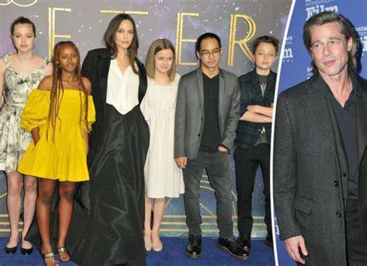 Brad Pitt and his children Pax and Shiloh in California in 2014. | Source: Getty Images
