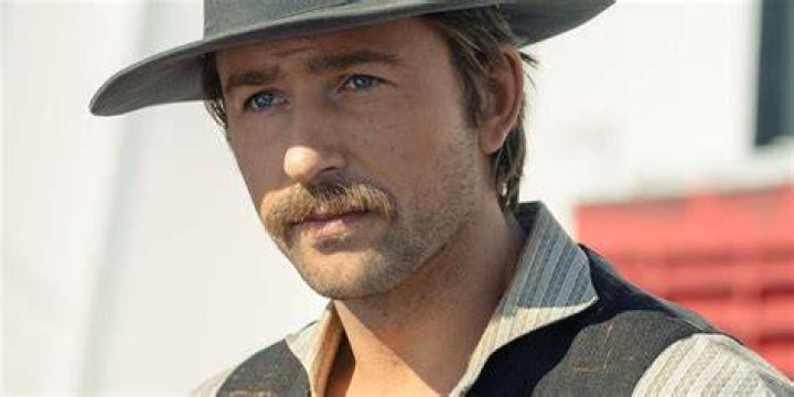 Brandon Sklenar as Spencer Dutton in 1923. Spencer hunts with his companions in Africa.