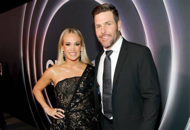 Carrie Underwood with her husband Mike Fisher and their son Isaiah in Hollywood in 2018 | Source: Getty Images