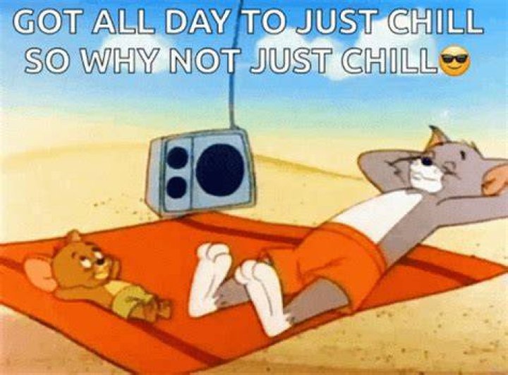 Chilling: tom shrugged on a blue cotton shirt and grey shorts