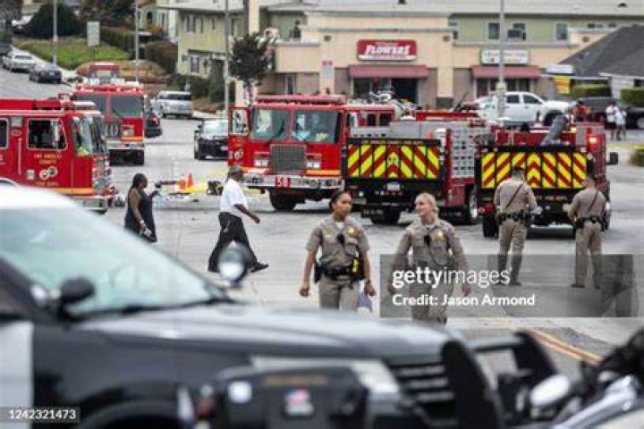 CHP and other officials investigate the fiery crash where six were killed and another eight were taken to hospital