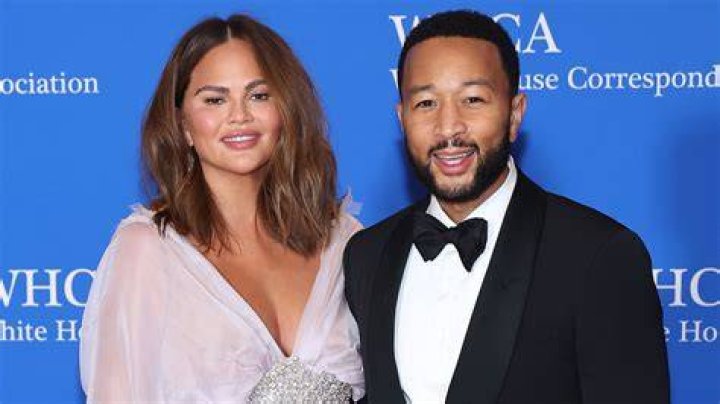 Chrissy Teigen and husband John Legend with their kids Miles and Luna on October 31, 2018 | Photo: Getty Images