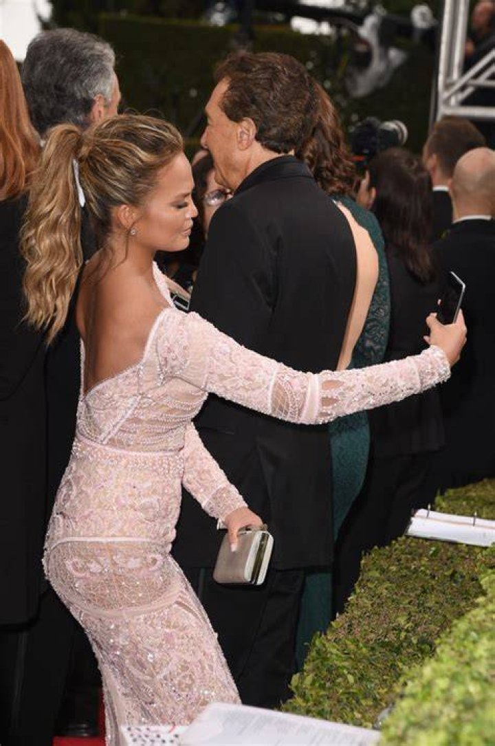 Chrissy Teigen at the 72nd Annual Golden Globe Awards [left], John Legend and Fergie at Movies Rock on December 2, 2007 [bottom circle], John Legend and Petra Nemcova at the 2007 Angel Ball on October 29, 2007 [top circle]| Photo: Getty Images