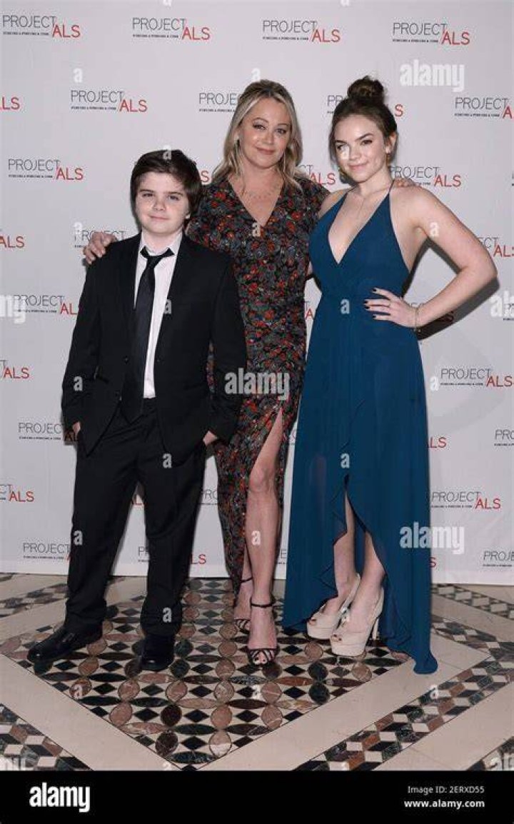 Christine Taylor and her children Ella Stiller and Quinlin Stiller watch as actor Ben Stiller is honored with a hand and footprint ceremony at the TCL Chinese Theatre on December 3, 2013 in Los Angeles, California. | Source: Getty Images
