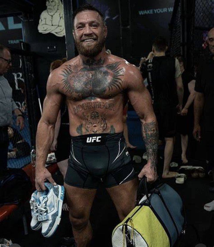 Conor McGregor revealed he has shaved his beard off as he posed for a picture with his wife