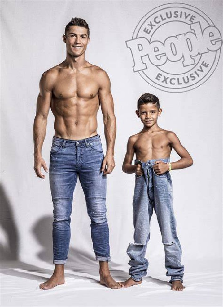 Cristiano Ronaldo poses with his girlfriend Georgina Rodriguez after his team won the UEFA Champions League final football match between Liverpool and Real Madrid at the Olympic Stadium in Kiev, Ukraine on May 26, 2018. | Source: Getty Images
