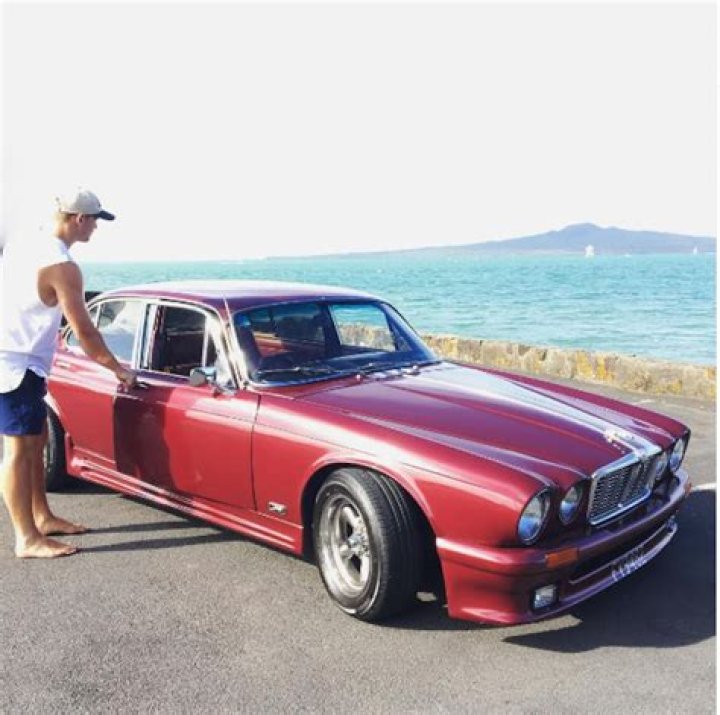 Dalton Papalii with his Jaguar in Auckland. Photo / File