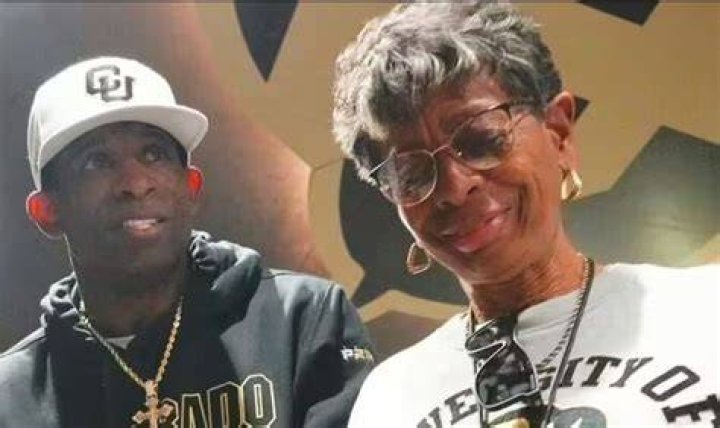 Deion Sanders with his mother Connie Knight with an old lady on September 14, 2018.