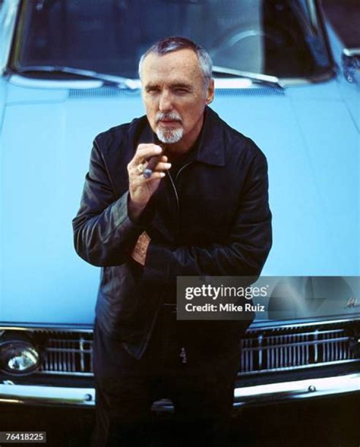 Dennis Hopper poses for a portrait at a restaurant in 1955. | Source: Getty Images