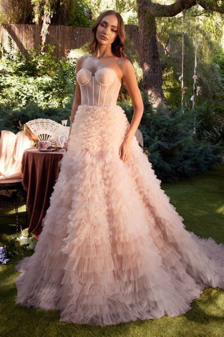Divine: The breathtaking strapless gown boasts a daring split and sparkling embroidery