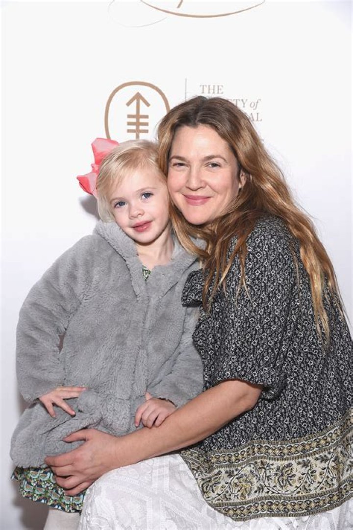 Drew Barrymore, Olive Barrymore Kopelman and Frankie Barrymore Kopelman attend the Baby2Baby Holiday Party on December 13, 2014 in Los Angeles, California | Source: Getty Images