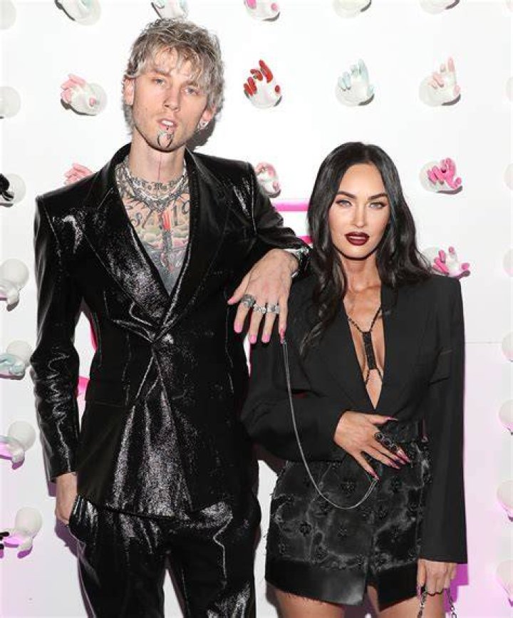 Engaged couple: Megan Fox and fiance Machine Gun Kelly are shown last month in Las Vegas