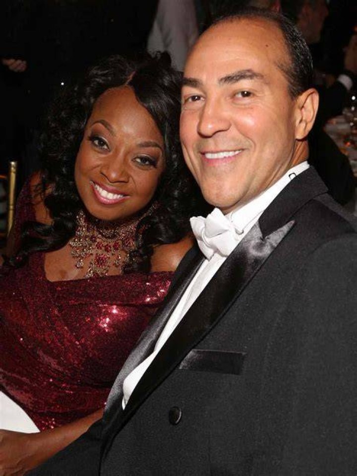 Epitome of elegance: Star Jones, 60, was elegant as ever in a blazer inspired dress, which she adorned with a Chanel brooch The TV personality accessorized with a variety of silver jewels, including dangling earrings