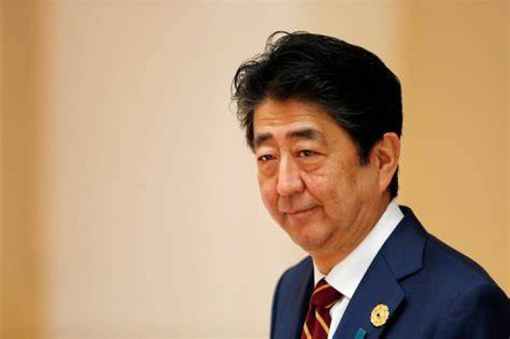 Former Prime Minister Shinzo Abe is on a stretcher to a helicopter after being shot in front of Yamatosaidaiji Station