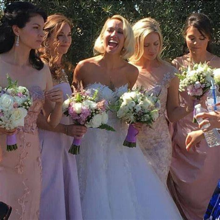 Fun times: The bridesmaids were seen having fun and running around during the ceremony at the Peltz $103million estate