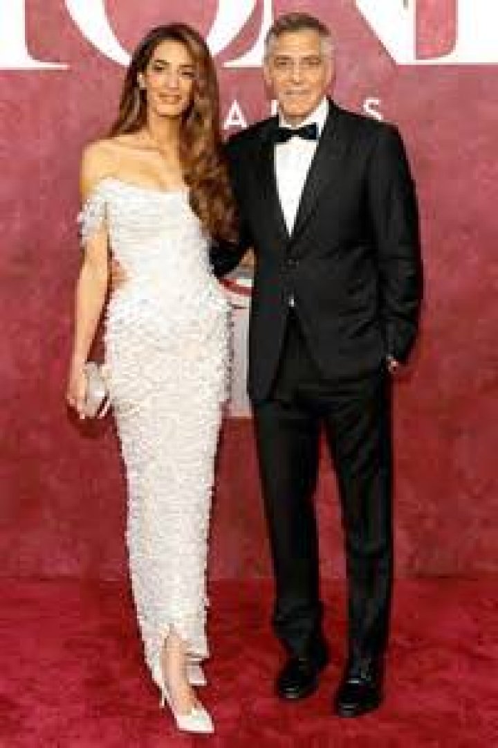 George Clooney and his fiancee Amal Alamuddin attend the Celebrity Fight Night gala celebrating Celebrity Fight Night In Italy on September 7, 2014 in Florence, Italy | Source: Getty Images