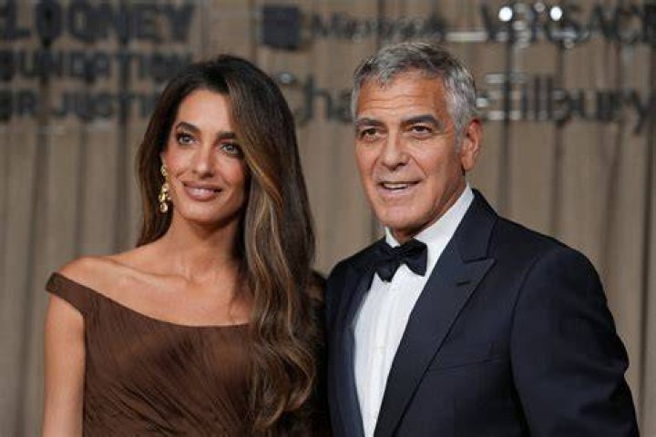 George Clooney and his lawyer wife Amal Clooney pictured on October 22, 2015 in Los Angeles, California | Source: Getty Images