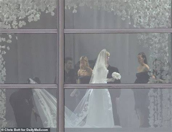 Gorgeous: Nicola stunned in an incredible Valentino bridal gown as she posed for her wedding photos after marrying Brooklyn – exclusive DailyMail.com pictures have revealed