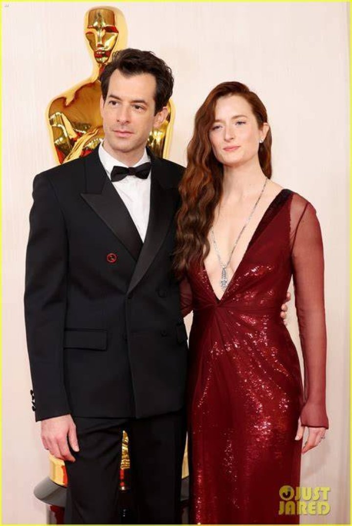 Grace Gummer and Mark Ronson holding hands