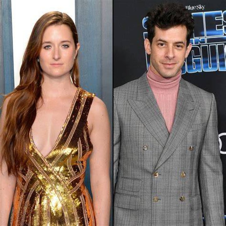 Grace Gummer with her arms wrapped around Mark Ronson