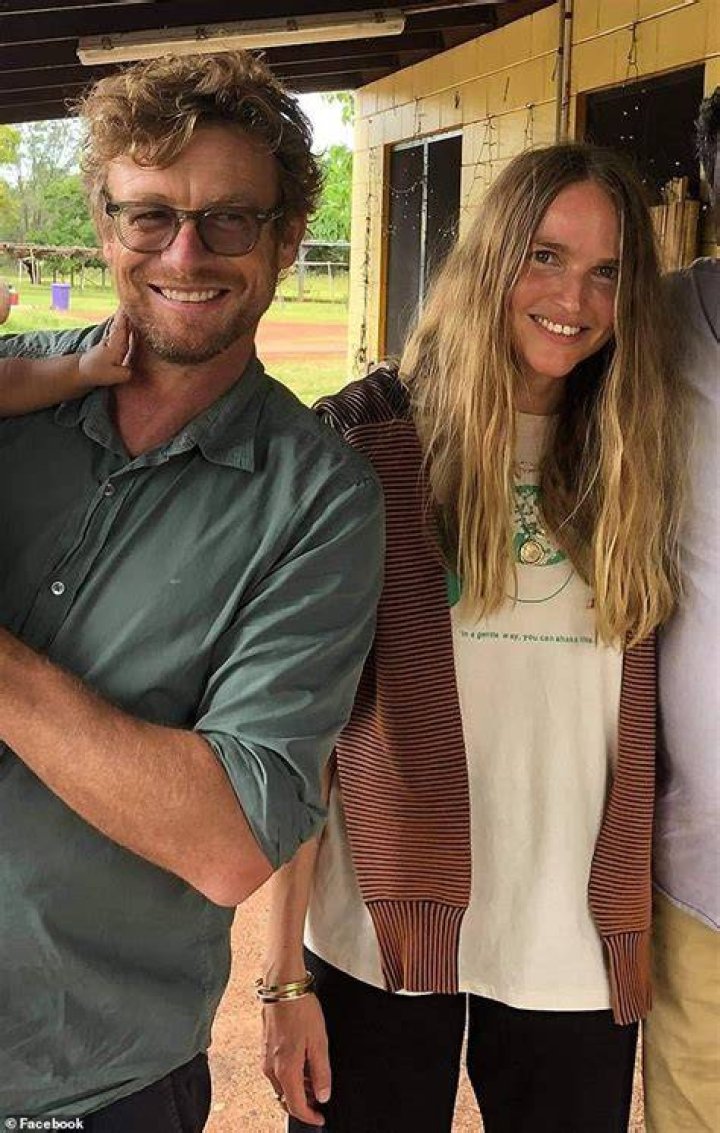 Having her say: Simon Baker's (left) ex Laura recently denied rumours the actor broke up with her because she attended an anti-vaccine mandate protest. Pictured in March