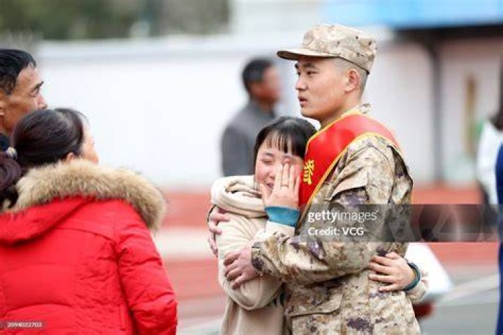Hugs: The ceremony was held in person this year following 2020's virtual event but proof of vaccination or a negative COVID-19 test were required for entry