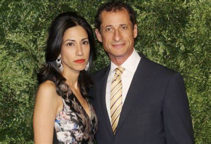 Huma Abedin, wife of Anthony Weiner, a leading candidate for New York City mayor, listens as her husband speaks at a press conference on July 23, 2013 in New York City | Source: Getty Images