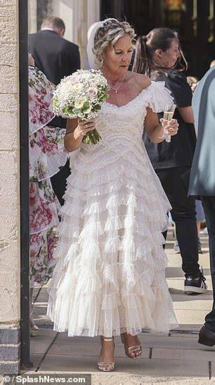 Incredible: Nicola clutched her bouquet of flowers as she looked every inch the bride