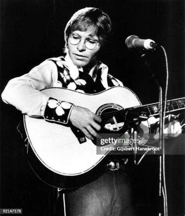 John Denver performs live at the Jaap Eden Hall, in Amsterdam, Netherlands, on July 8, 1979. | Source: Getty Images