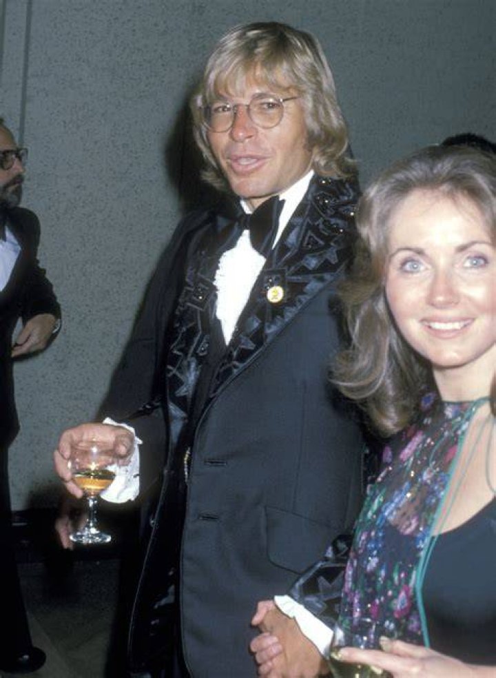 John Denver with his wife Ann Martell and their dog on October 13, 1997. | Source: Getty Images