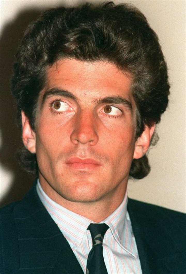 John F. Kennedy Jr. pictured with his head down while his girlfriend, Daryl Hannah, talks to him during game between the New York Knicks and the Houston Rockets at Madison Square Garden. / Source: Getty Images