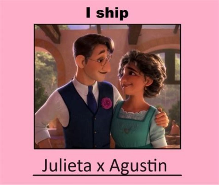 Julieta standing with Agustin in Encanto.