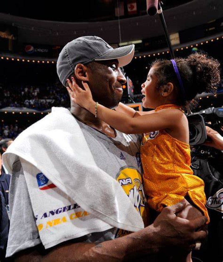 Kobe and Gianna on June 14, 2009 after winning his fourth NBA Championship title
