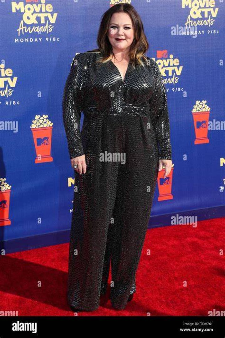 (L) Actress Melissa McCarthy arrives at the premiere of "The Boss" at Regency Village Theatre on March 28, 2016 in Westwood, California. (R) Ben Falcone and Melissa McCarthy attend the Viacom Winter TCA Panels and Party on January 13, 2017 in Pasadena, California. / Source: Getty Images